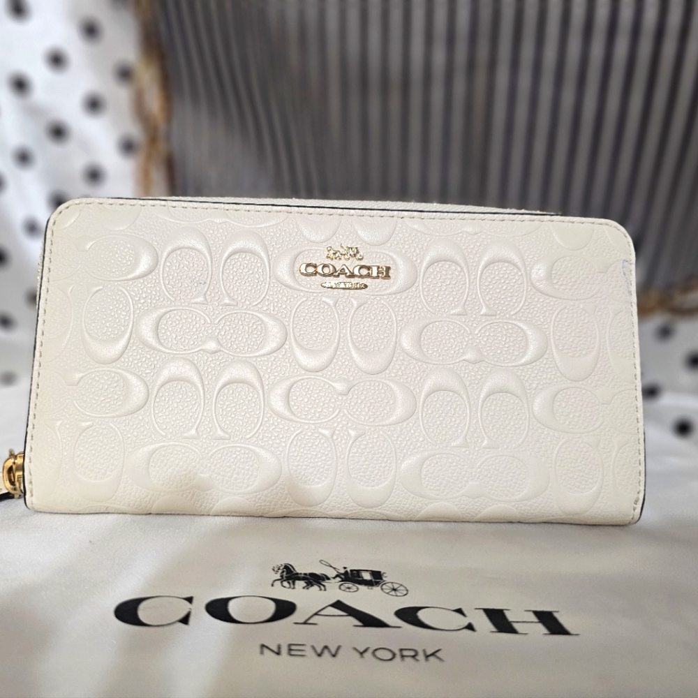 Coach ivory long zippy wallet